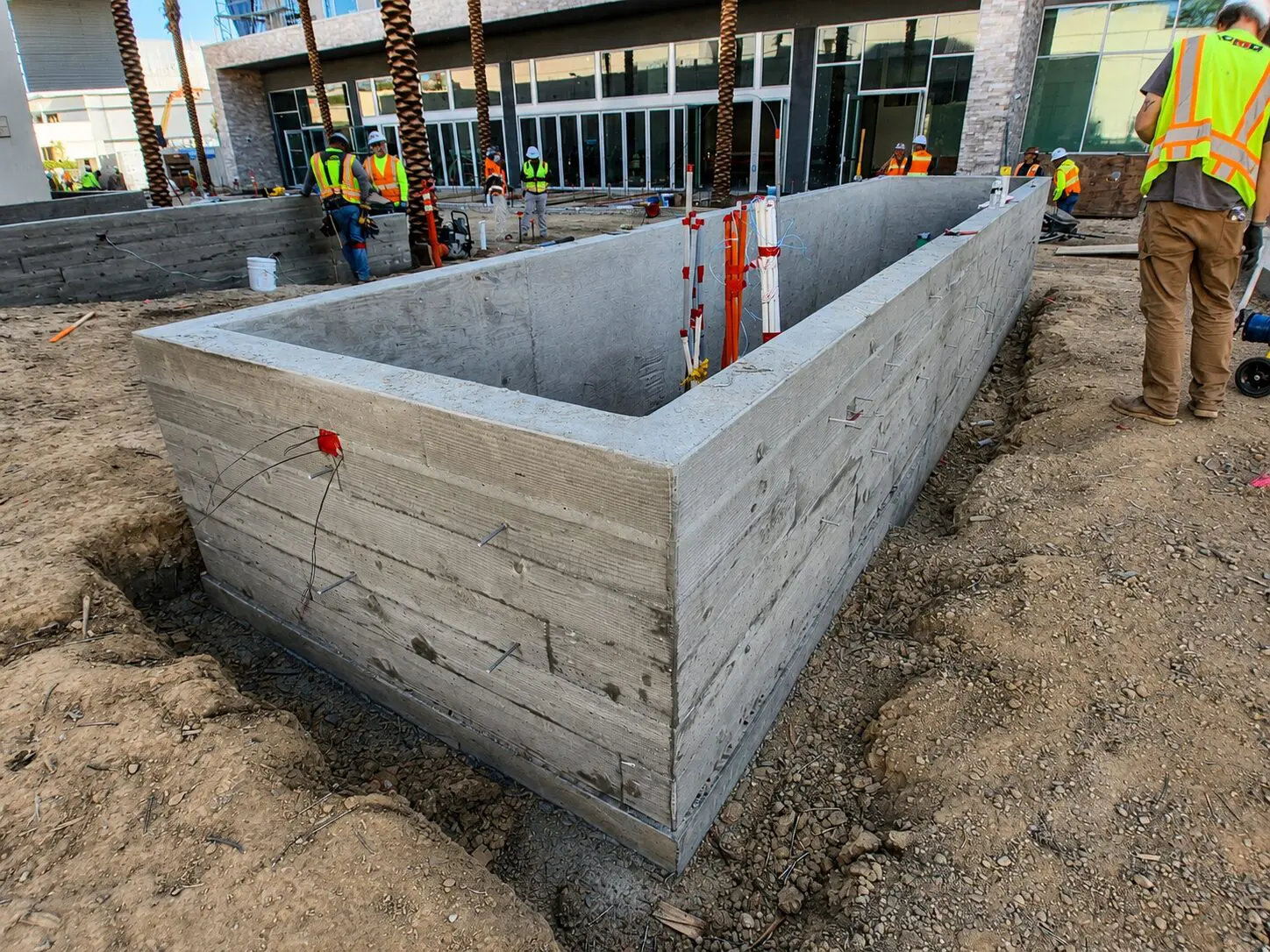 Construction workers at planter installation site