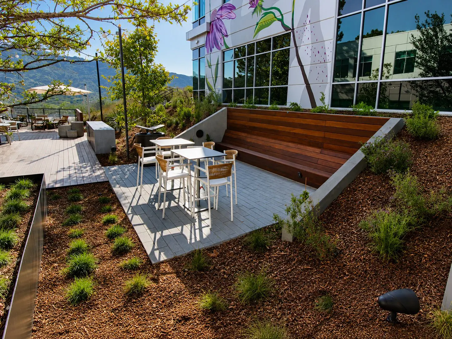 Outdoor patio with white table and chairs