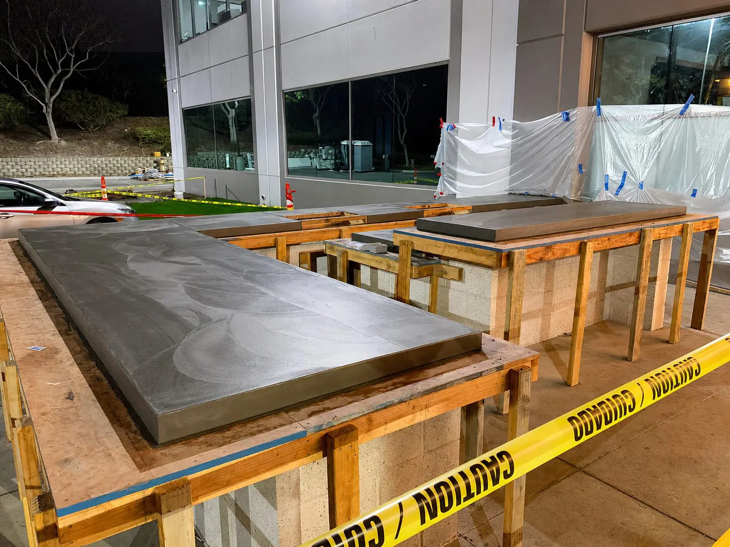 Concrete slabs on wooden frames at night