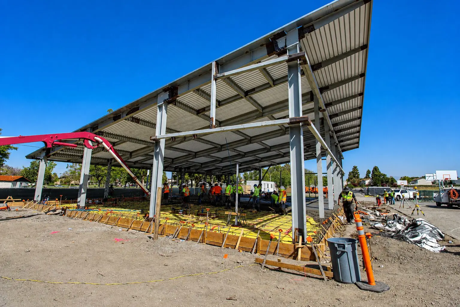 Workers building metal structure