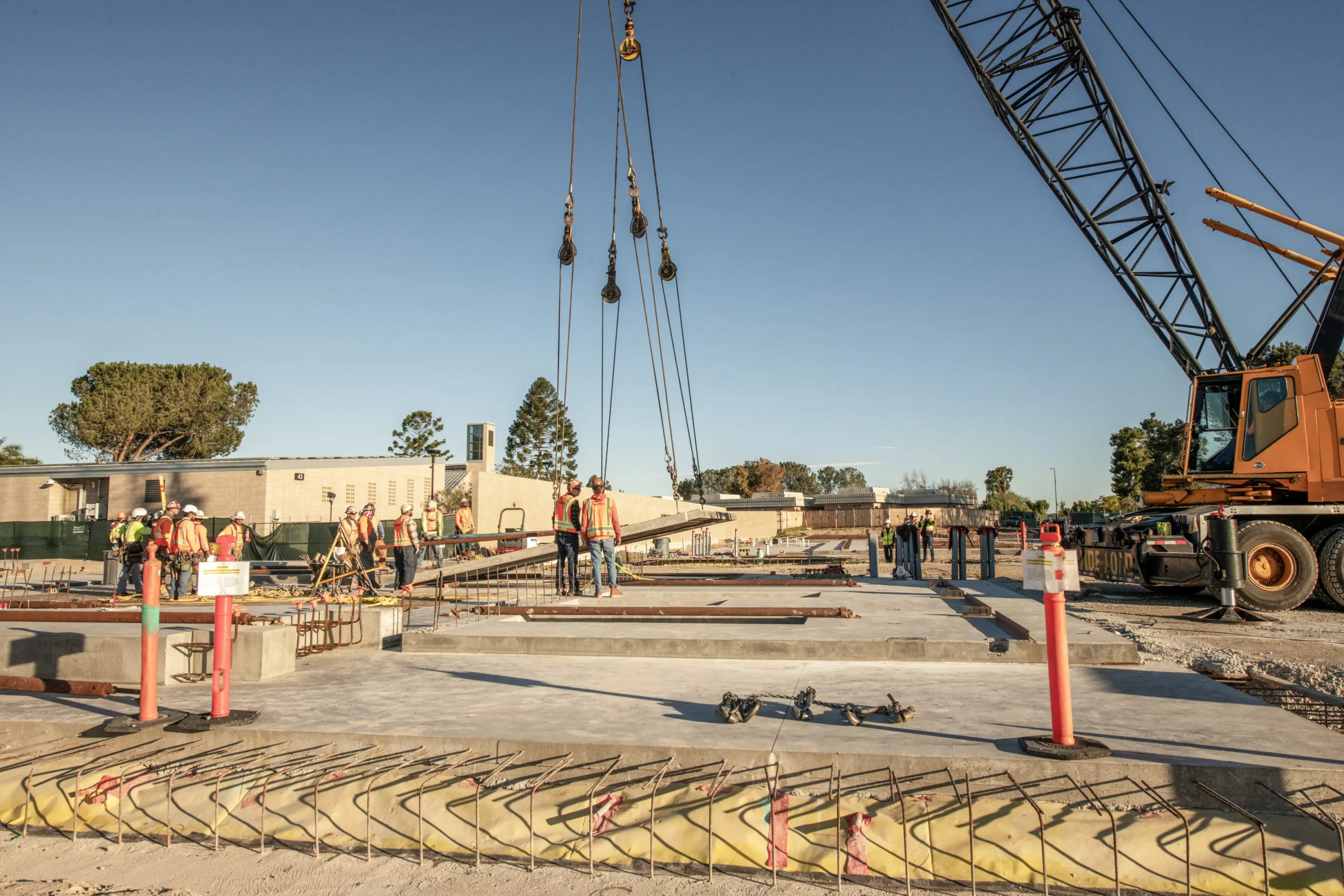 Construction site with crane and workers