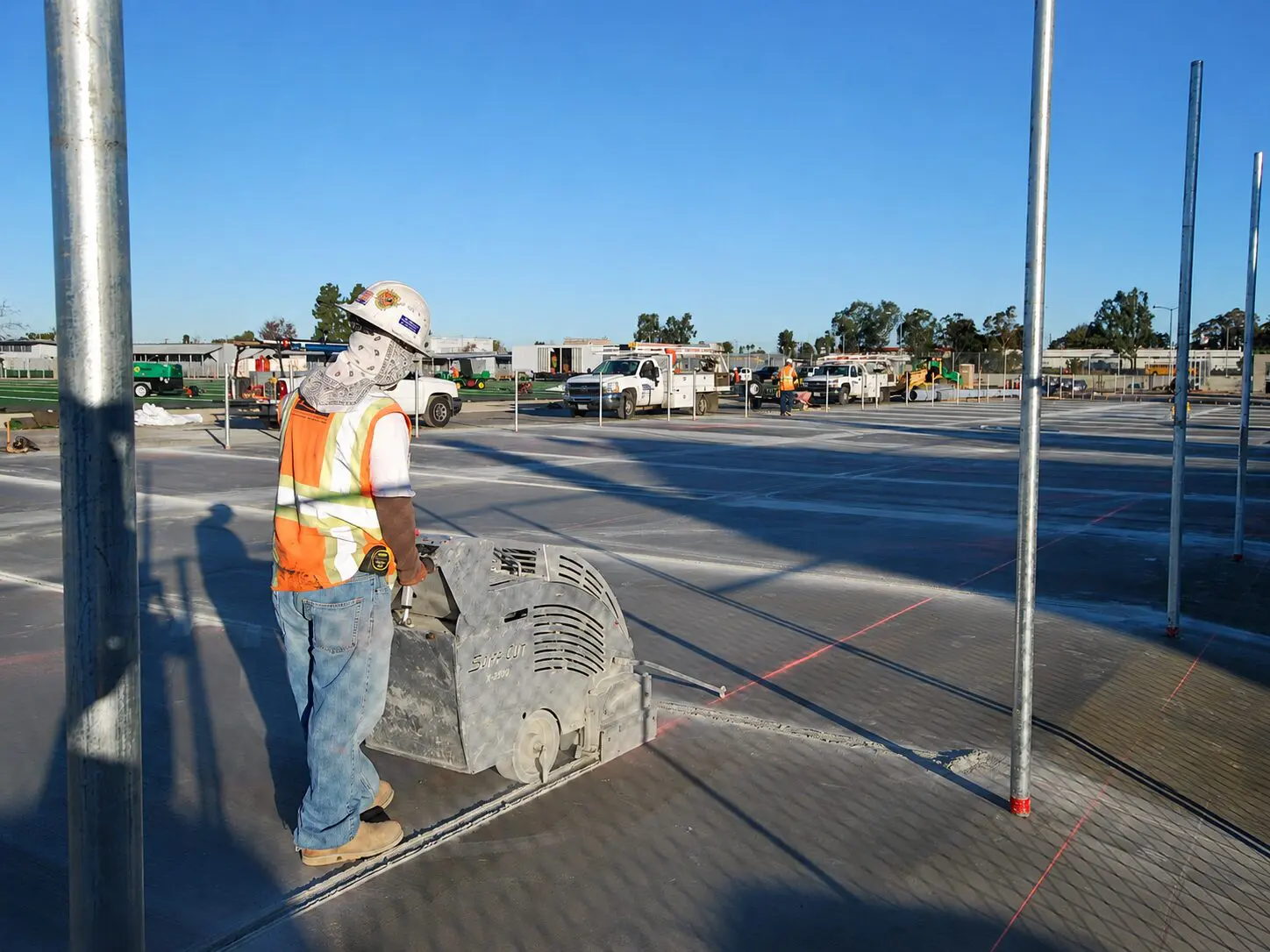 Construction worker operating machinery on site