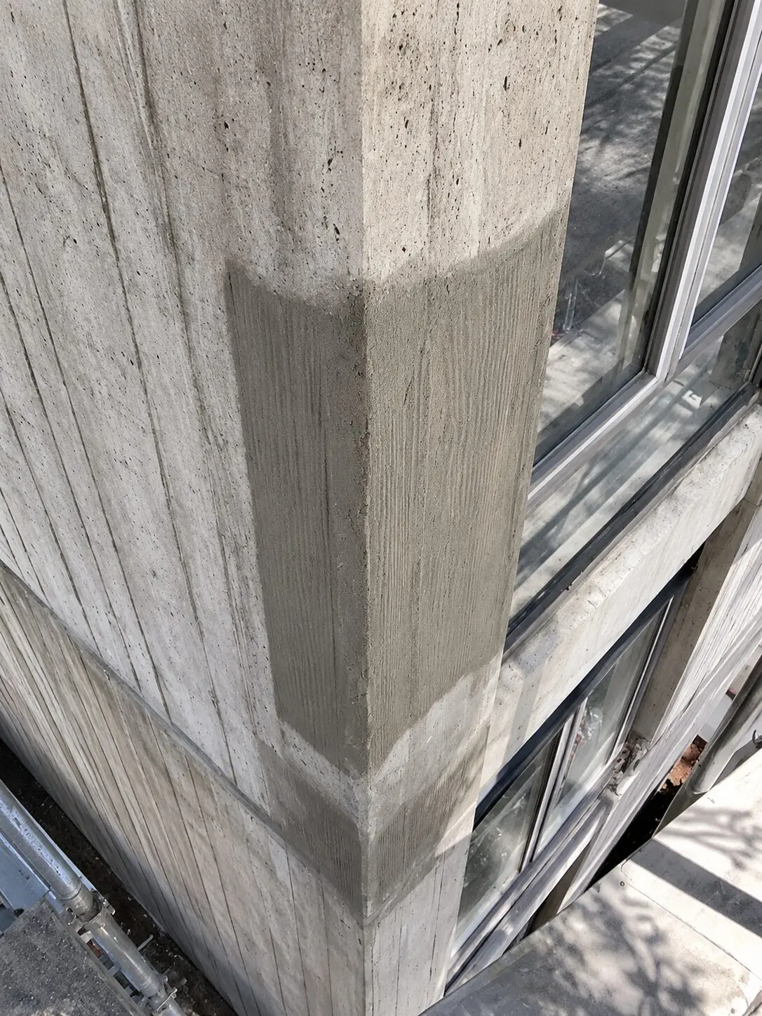 Close-up of concrete and glass facade