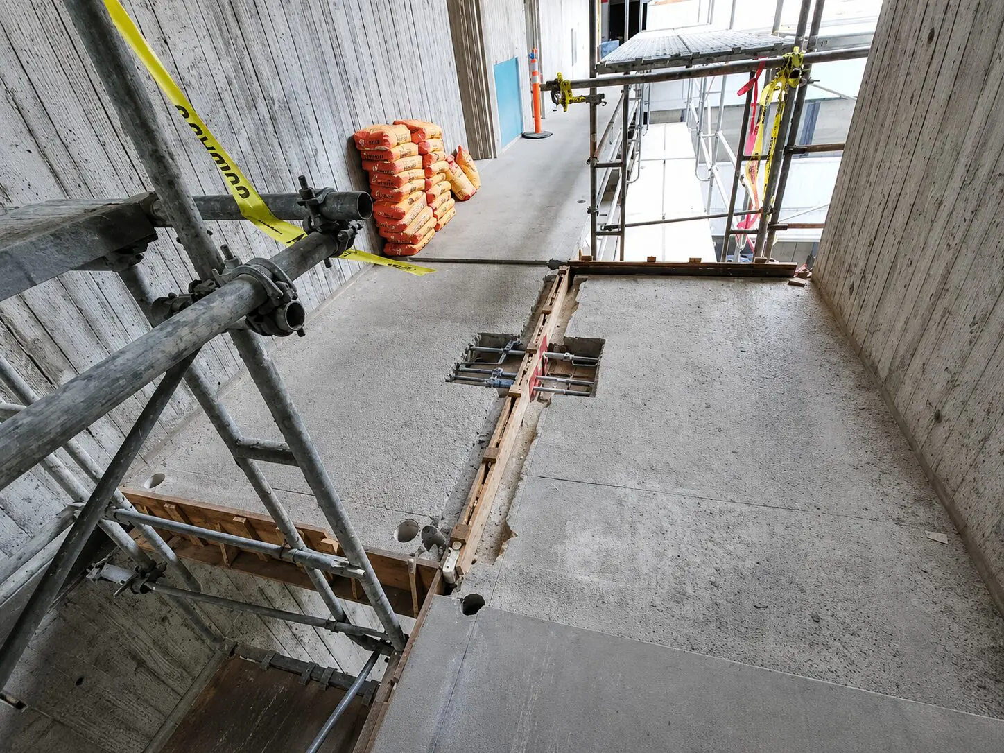Building site showing scaffolding and safety measures