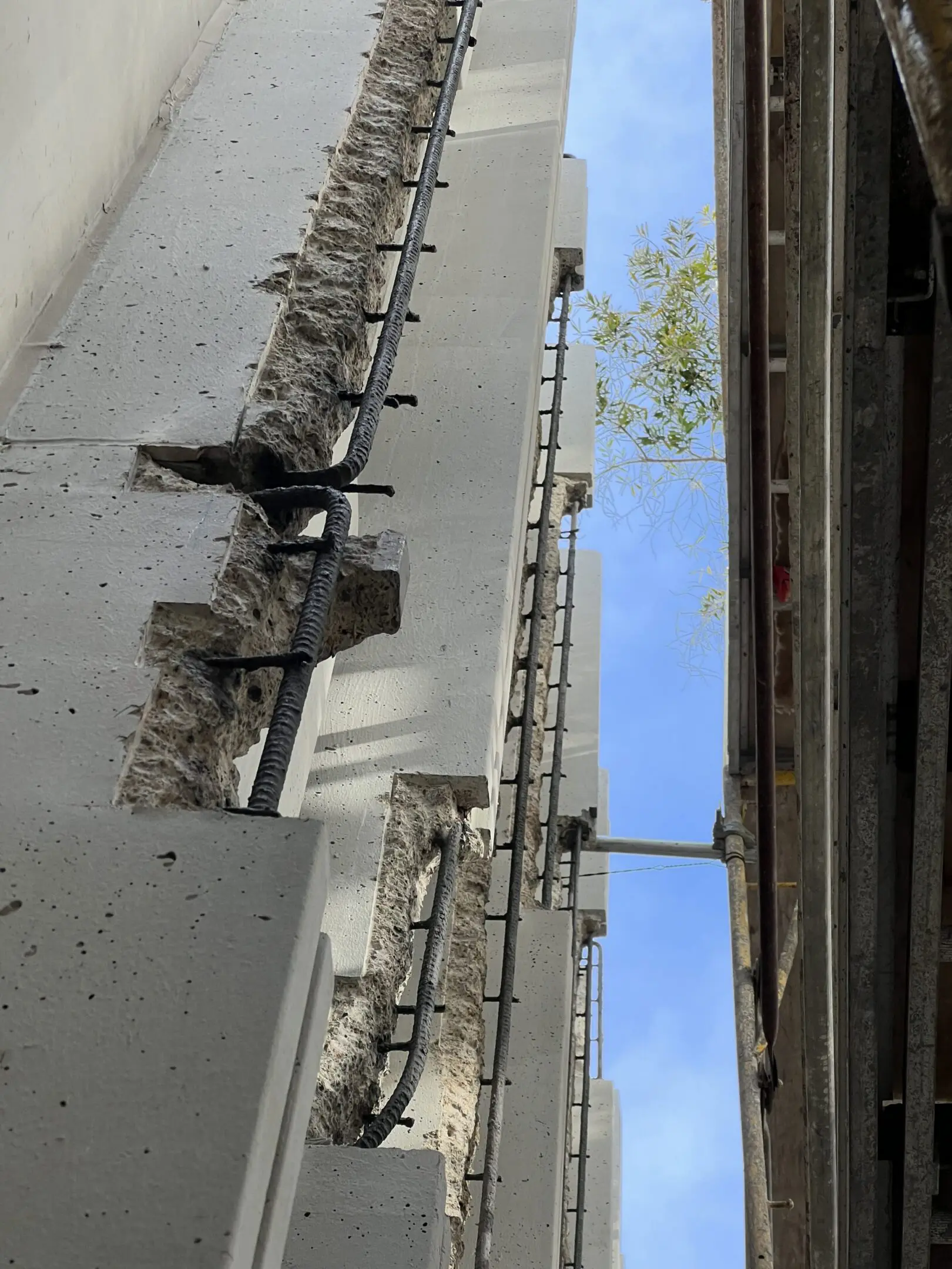 Concrete wall under construction with blue sky