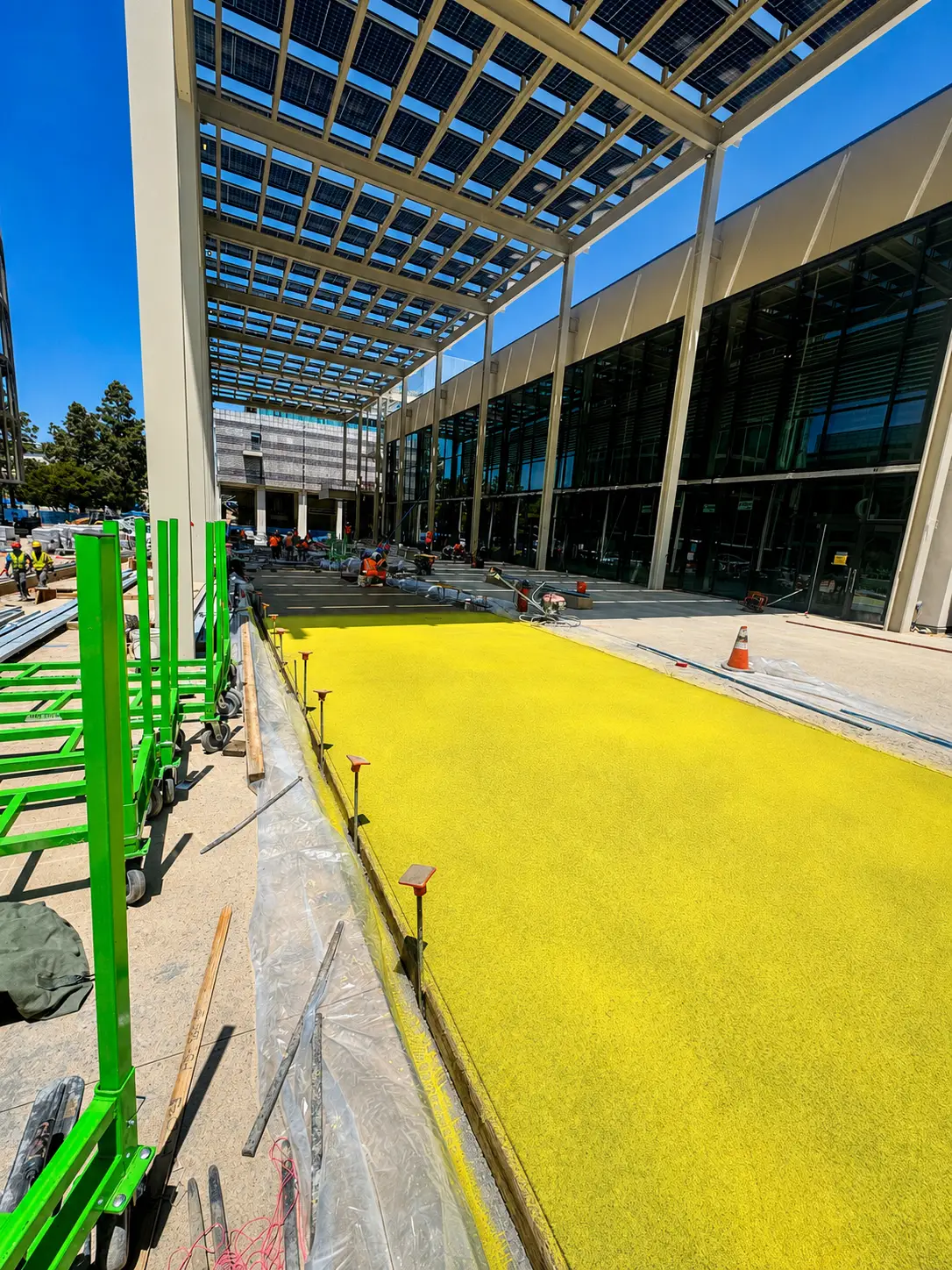 Building courtyard under construction with yellow ground
