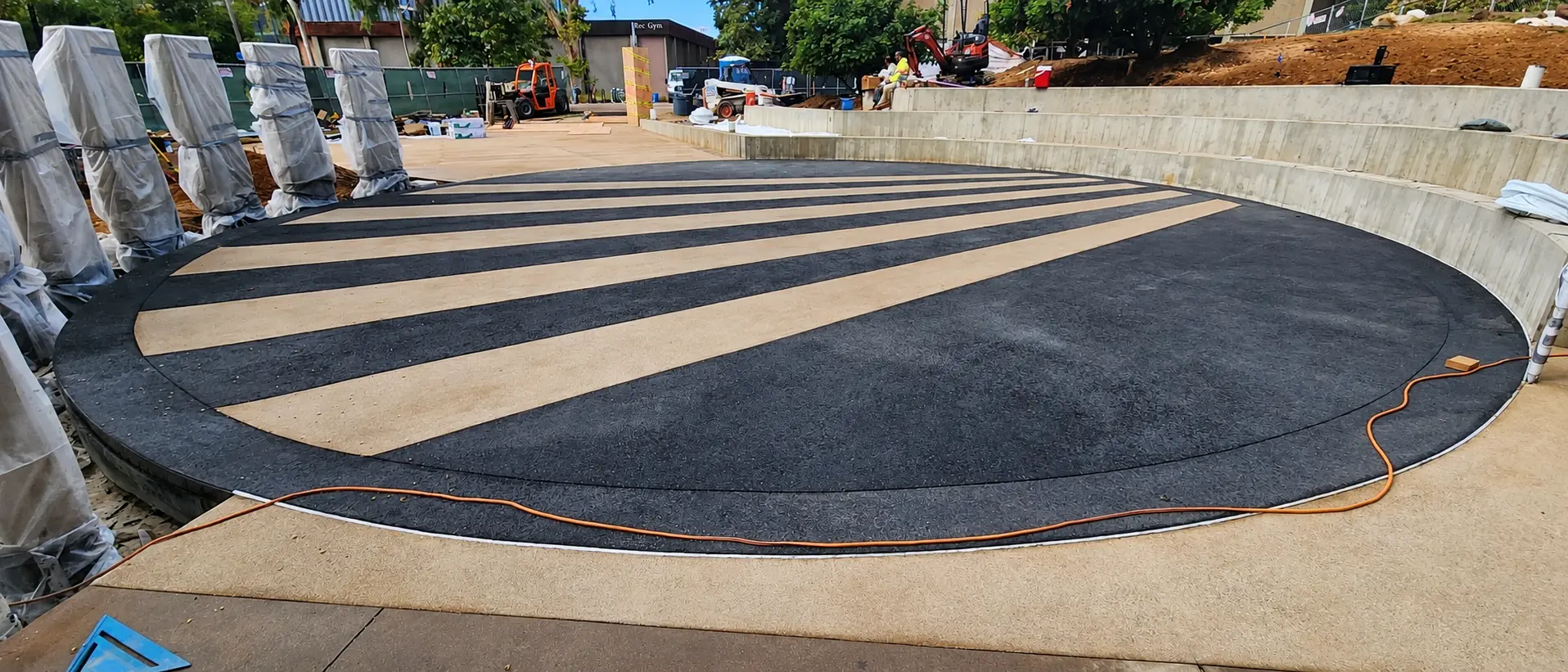 Outdoor amphitheater with striped flooring.