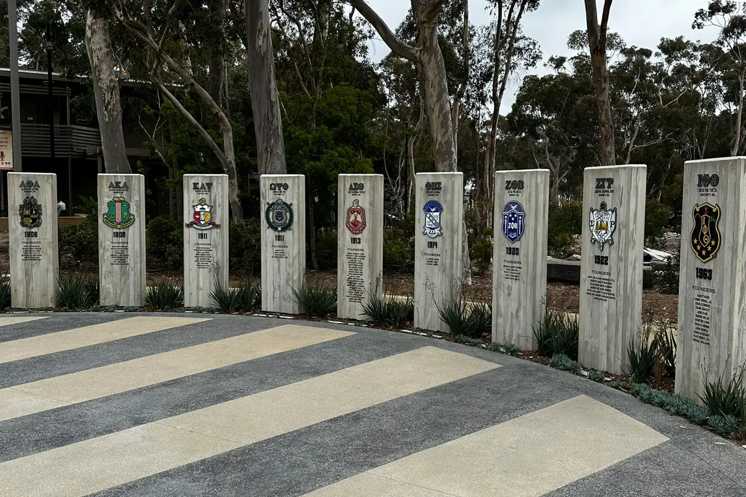 Memorial stone pillars with emblems