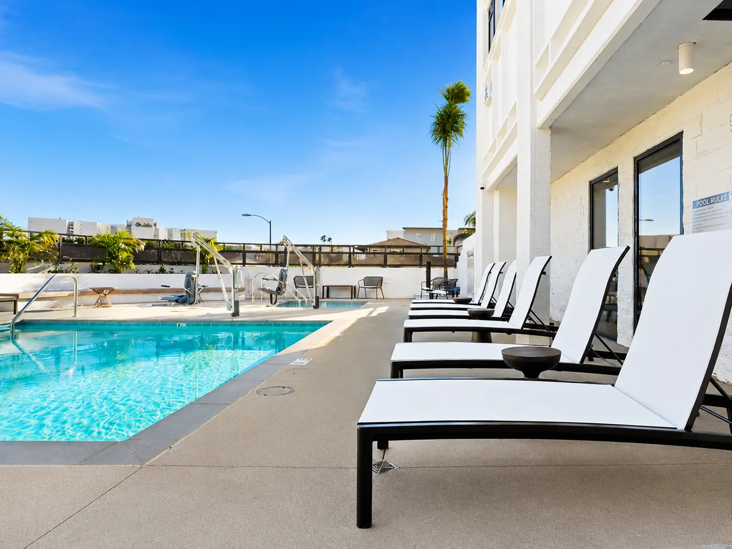 Relaxing pool area with clear sky
