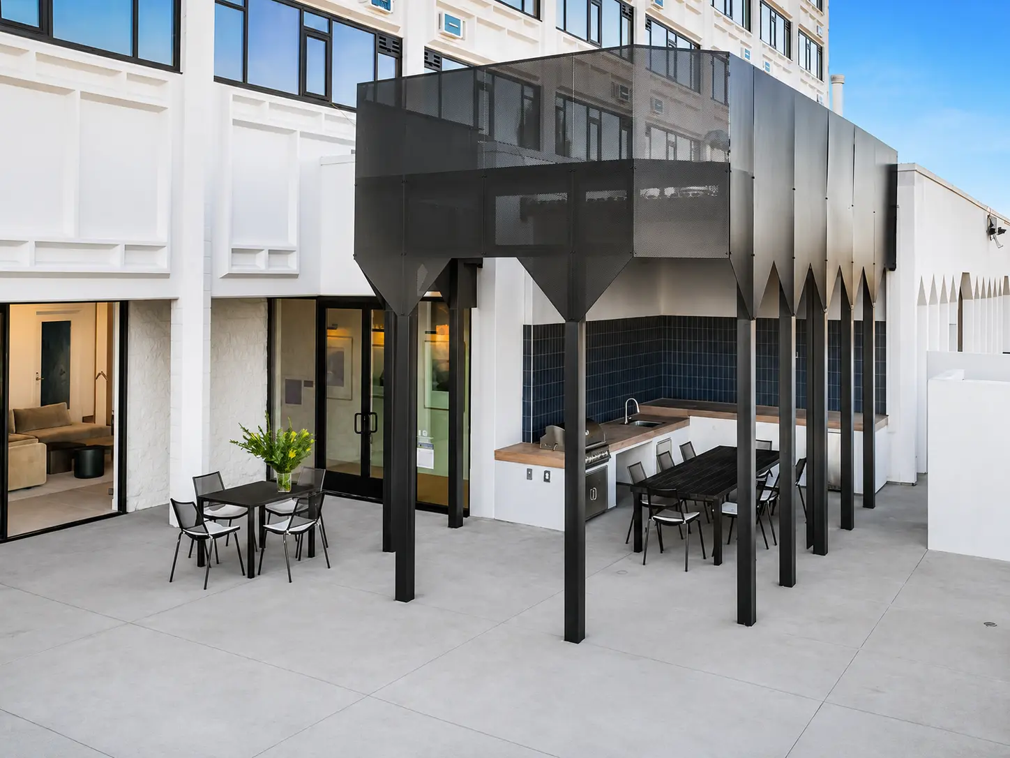 Modern outdoor patio with dining furniture