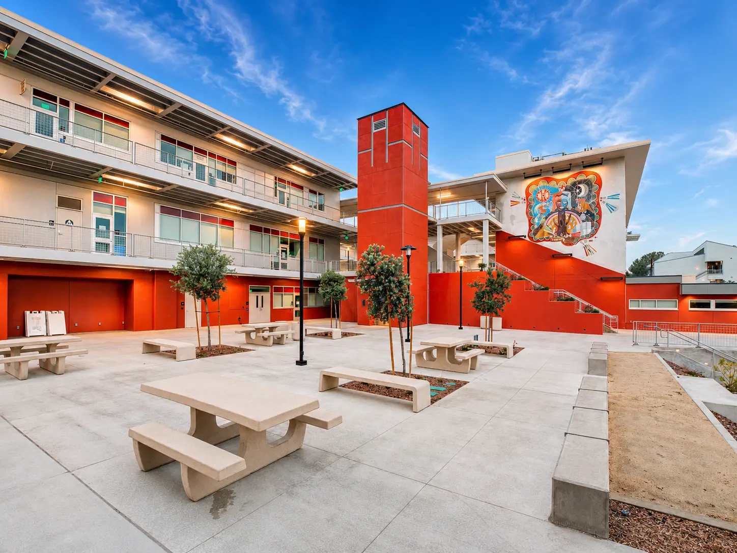 Modern school courtyard with red accents