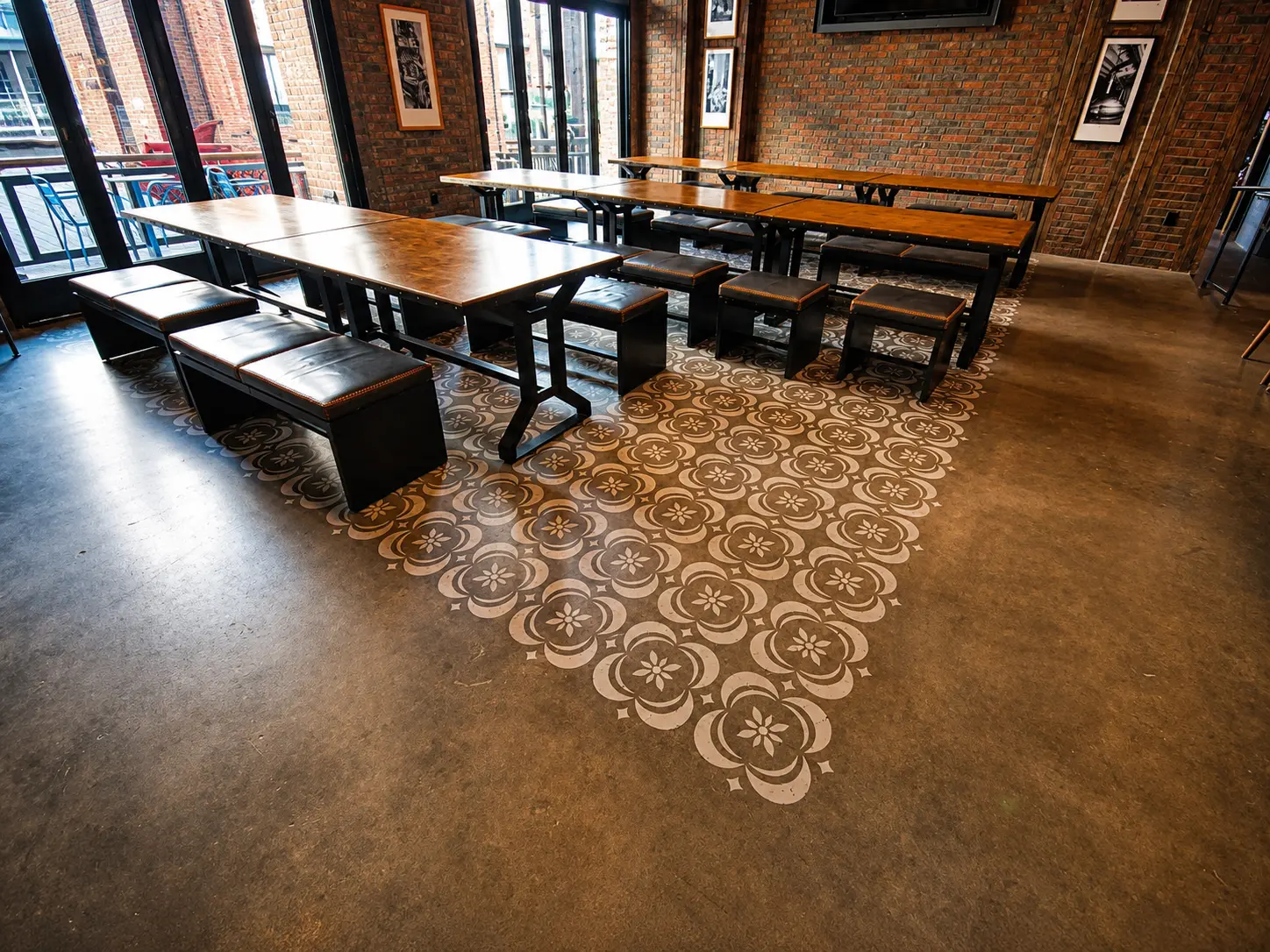 Industrial-style dining area with patterned floor