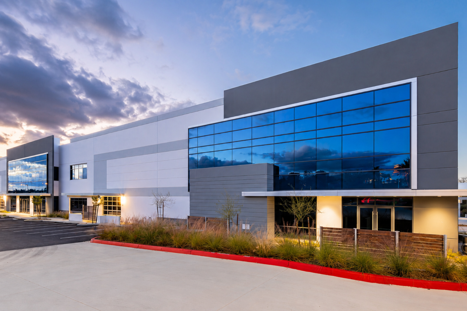 Modern office building at sunset